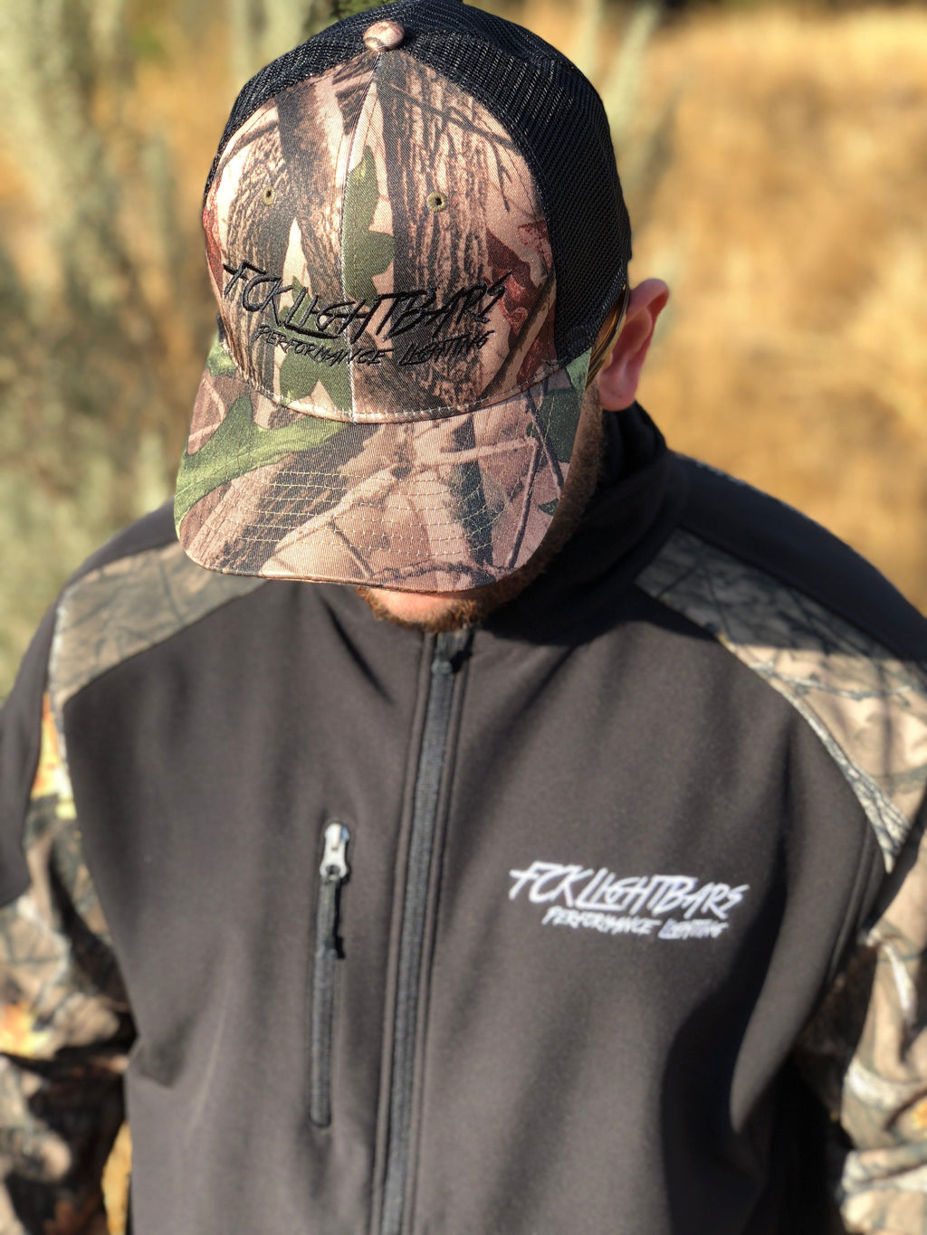 A man wearing Camo Snapback Hat (Black)